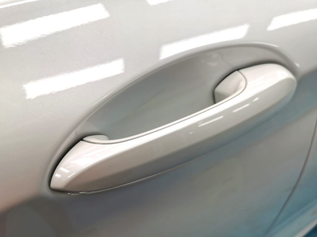 Front three-quarter view of the BMW iX3 after coating.