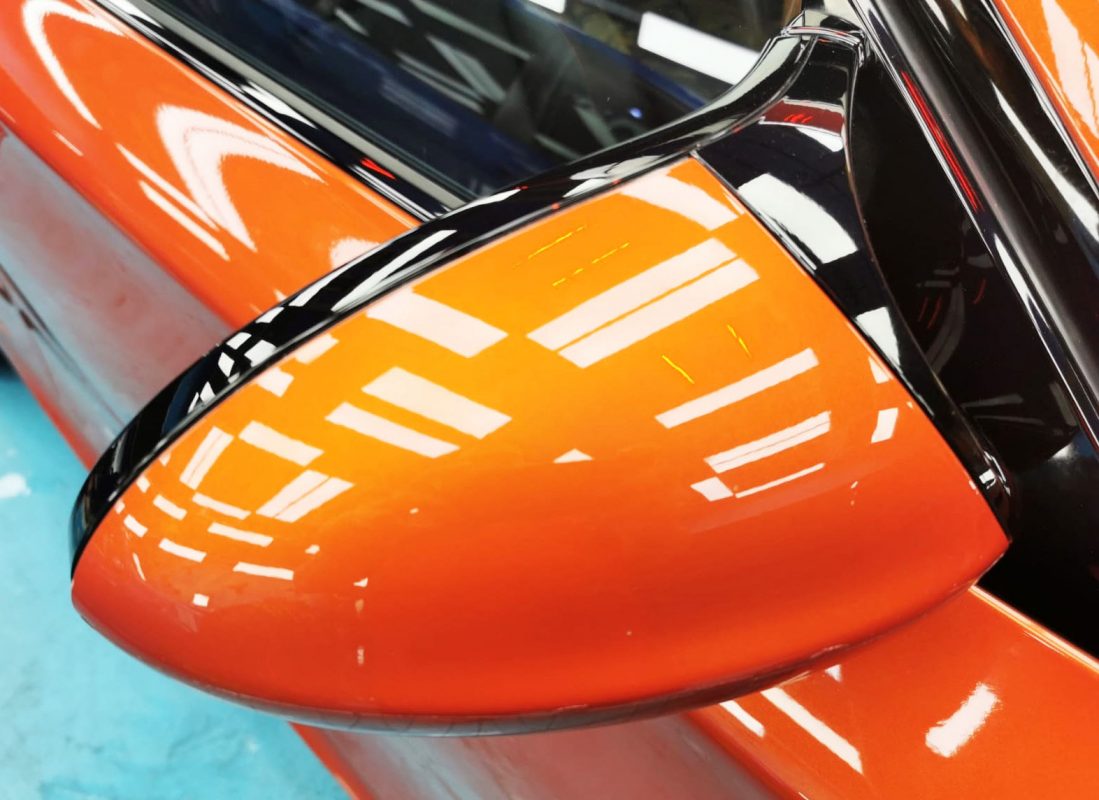 Rear quarter of the BMW M Coupe, glossy and protected.