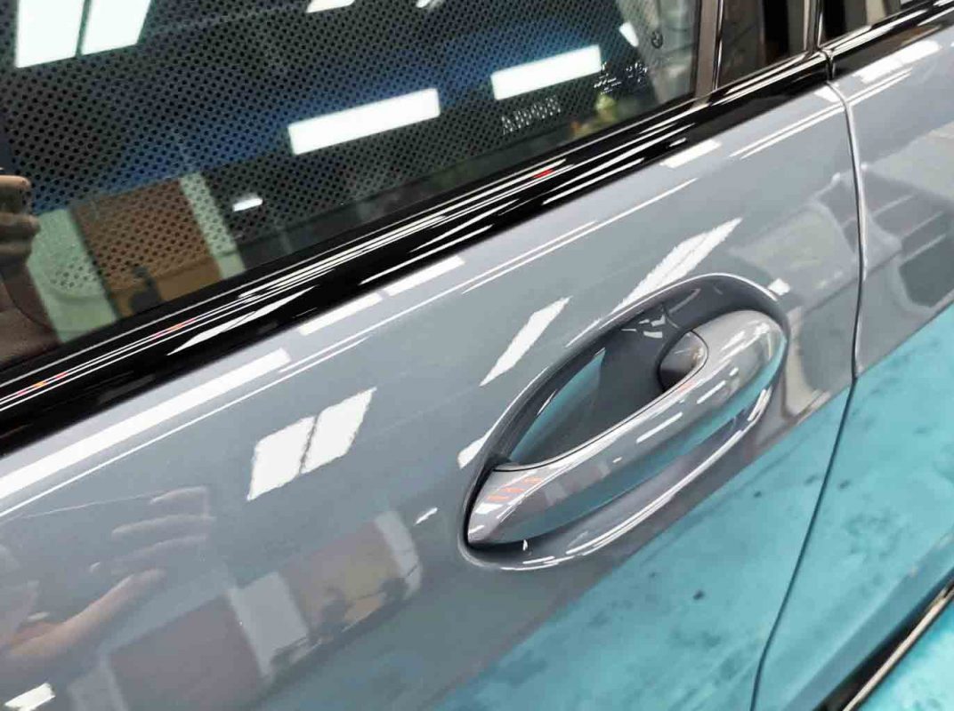 Front three-quarter view of the BMW M135 after coating.