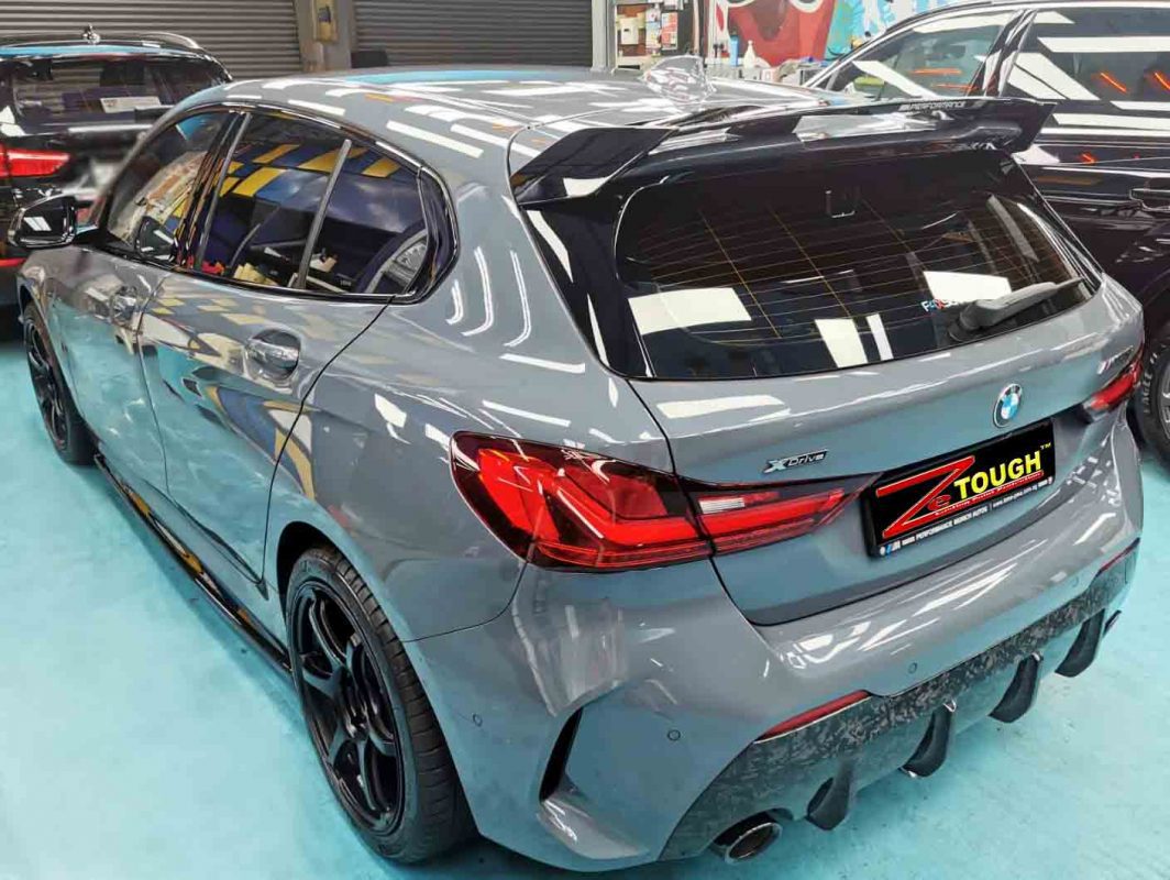 Rear quarter of the BMW M135, glossy and protected.