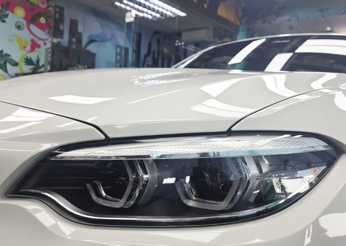 The M2's coated paintwork showing clean reflections.