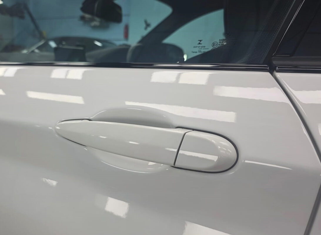 Front three-quarter view of the BMW M2 after coating.