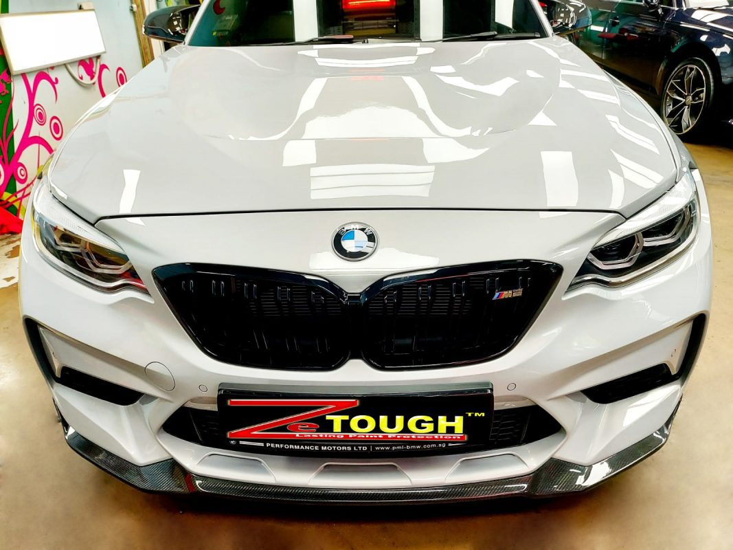 The BMW M2 from a side angle after the titanium coating.