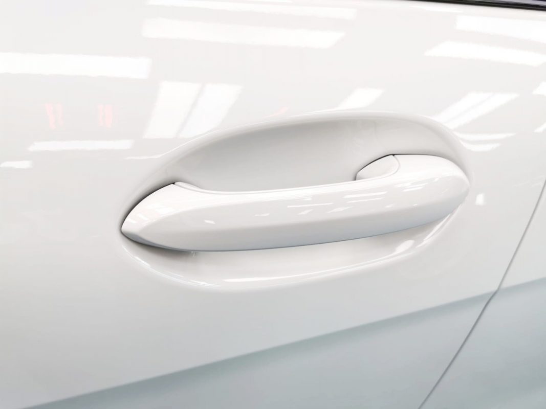 Front three-quarter view of the BMW M235i after coating.