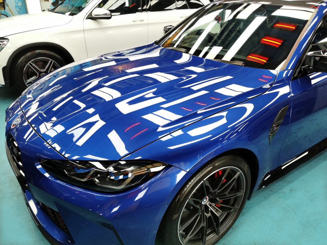 The BMW M3 from a side angle after the ceramic coating.