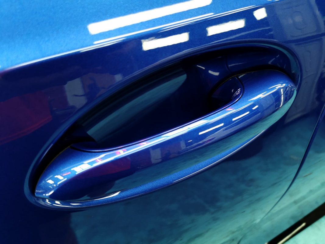 Front three-quarter view of the BMW M3 after coating.