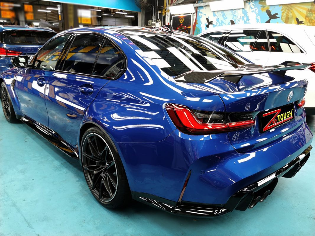 Rear quarter of the BMW M3, glossy and protected.