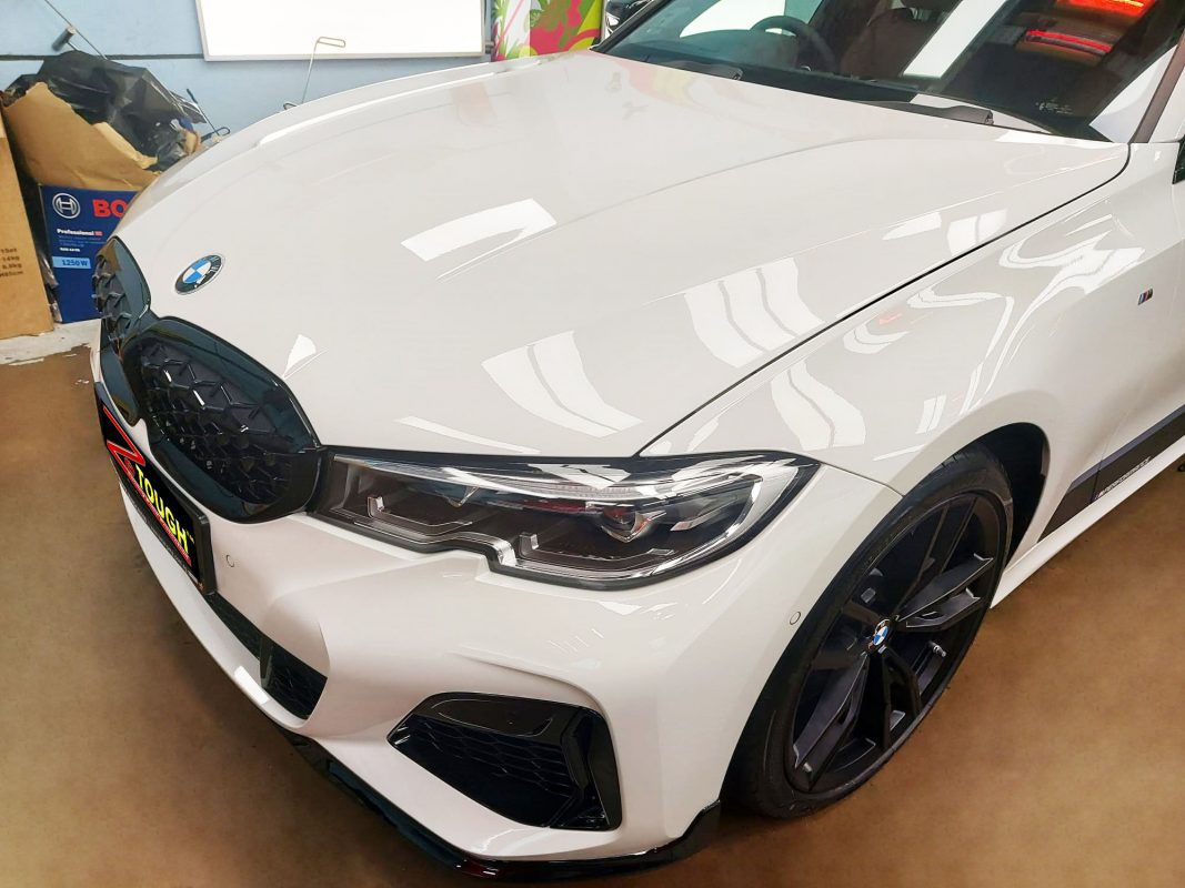 Side angle of the BMW M340i after the titanium coating.