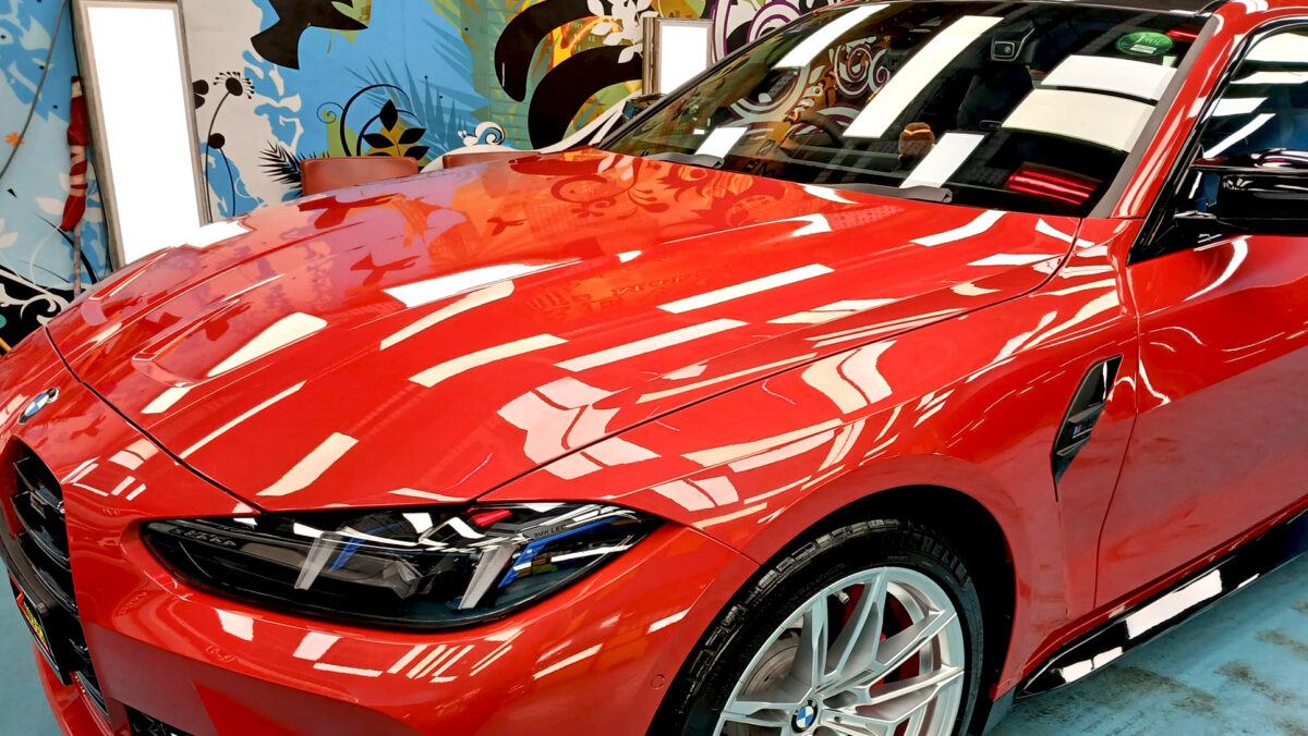 The BMW M4 from a side angle after the titanium coating.
