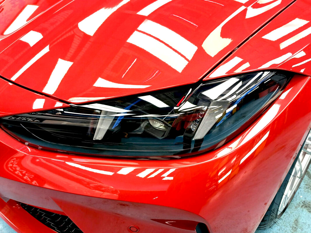 The M4's coated paintwork showing clean reflections.