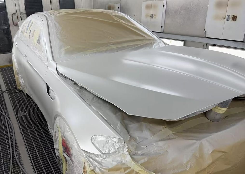 The M5 masked with paper inside the spray booth.