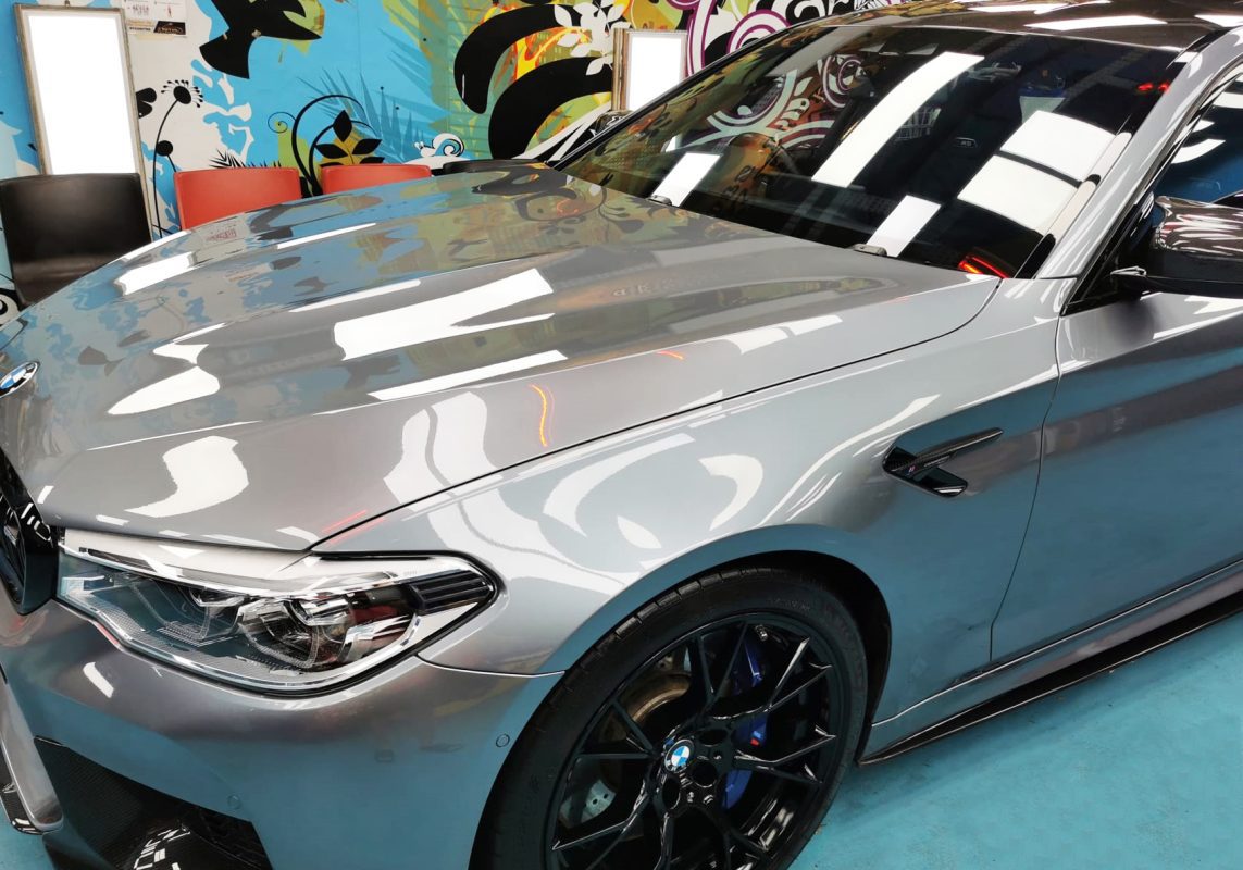 Side angle of the BMW M5 after the titanium coating.