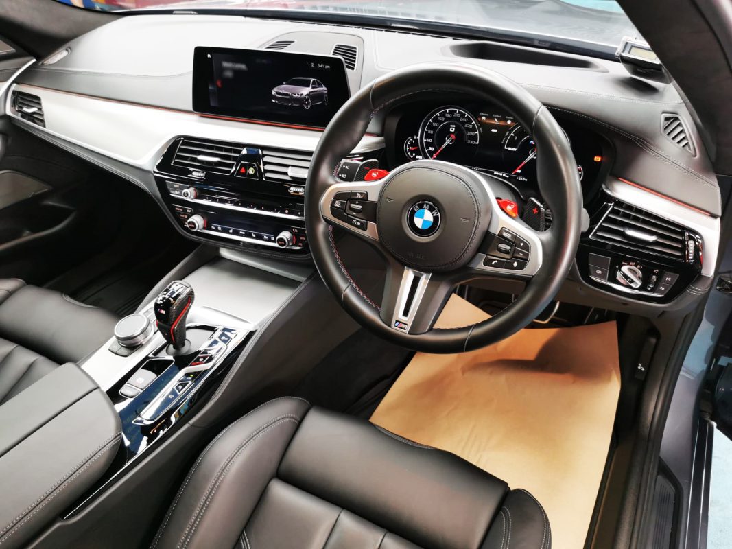 The M5 parked in the workshop, freshly coated.