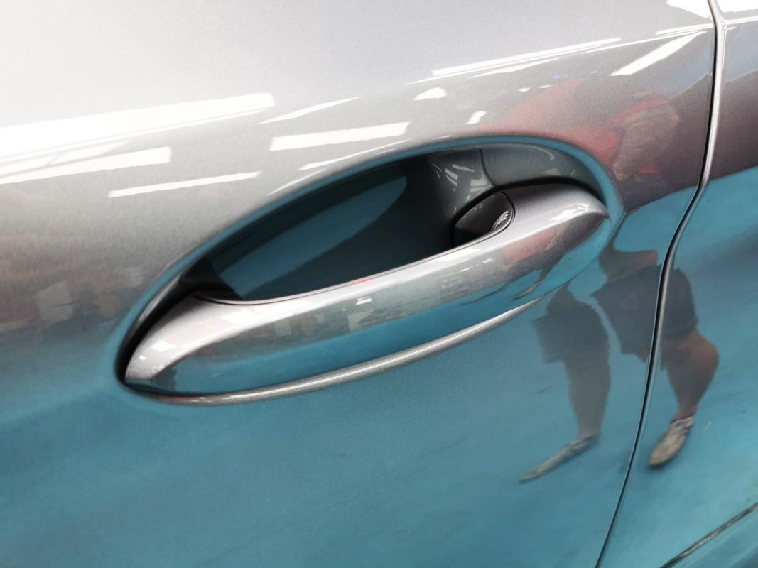 Rear quarter of the M5, glossy and protected.