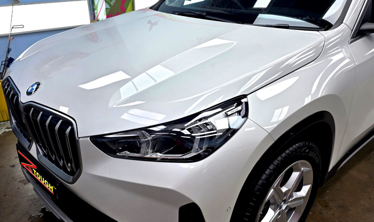 The BMW X1 from a side angle after the titanium coating.