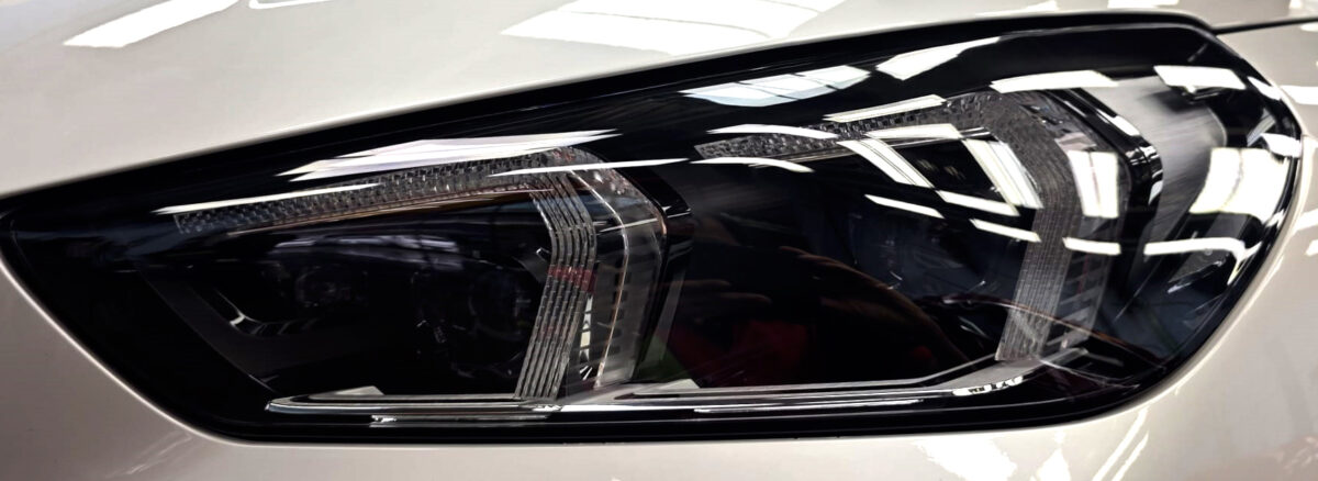 The X1's coated paintwork showing clean reflections.