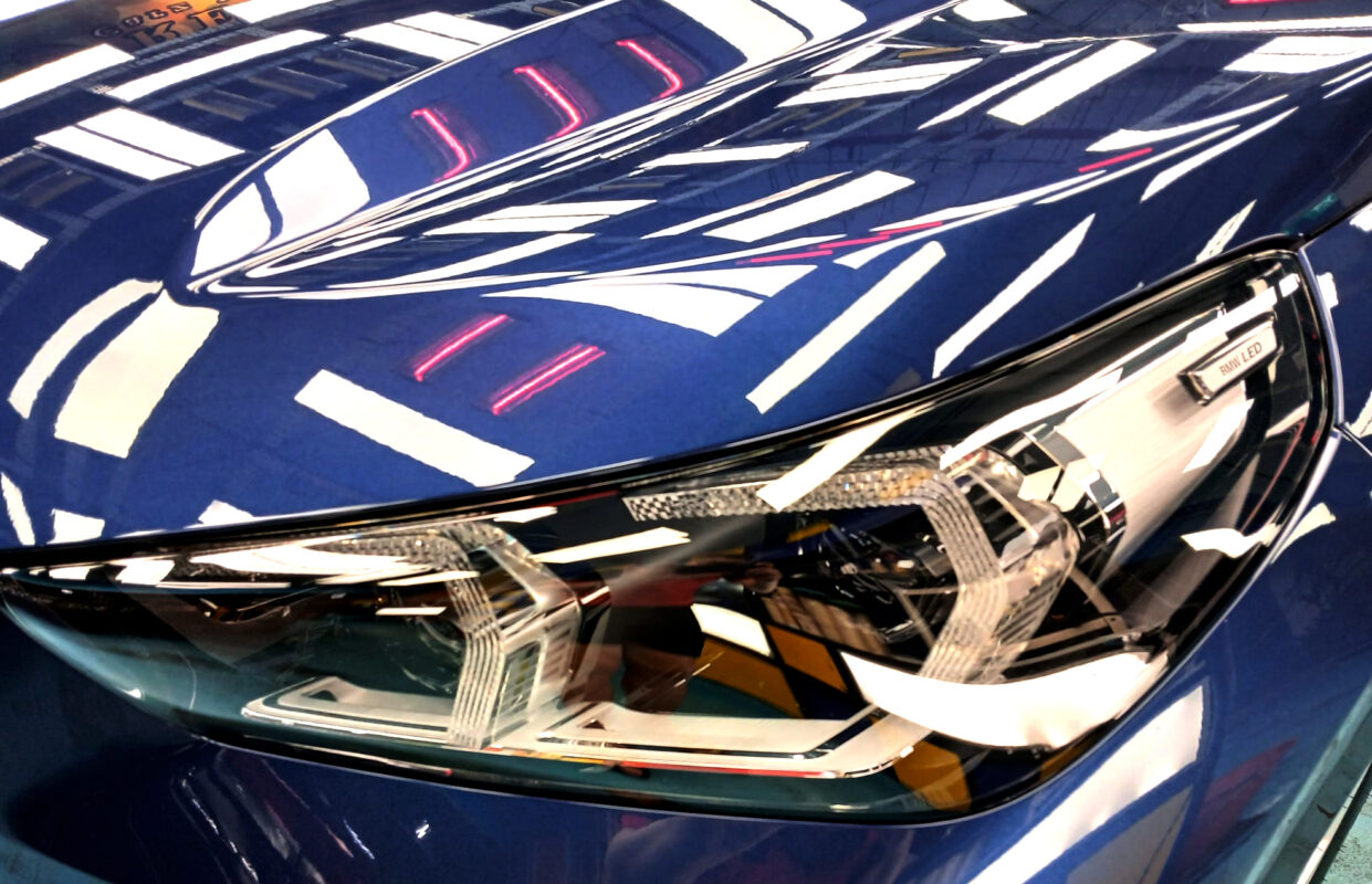The X1's coated paintwork showing clean reflections.