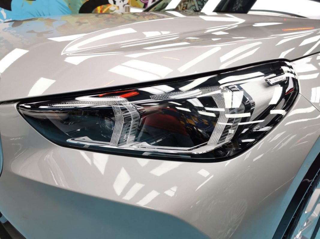 The X1's coated paintwork showing clean reflections.