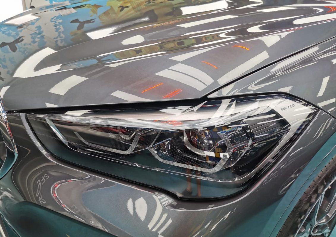The X1's coated paintwork showing clean reflections.