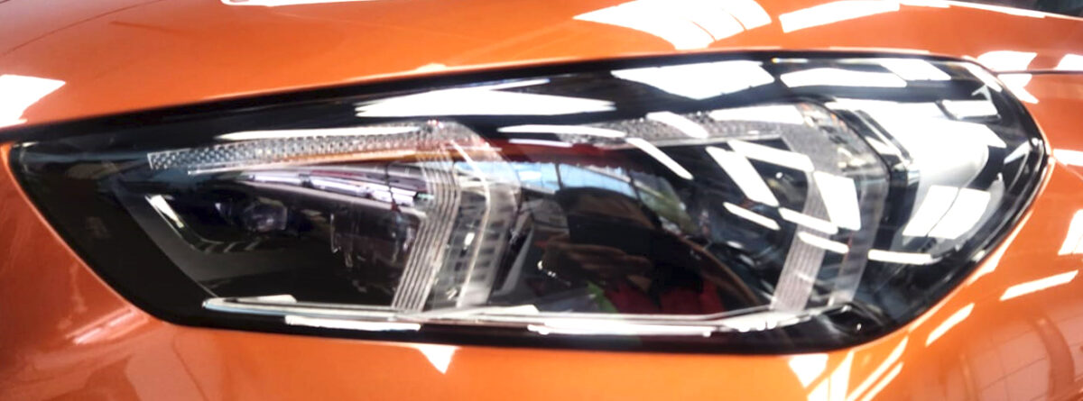 The X1's coated paintwork showing clean reflections.