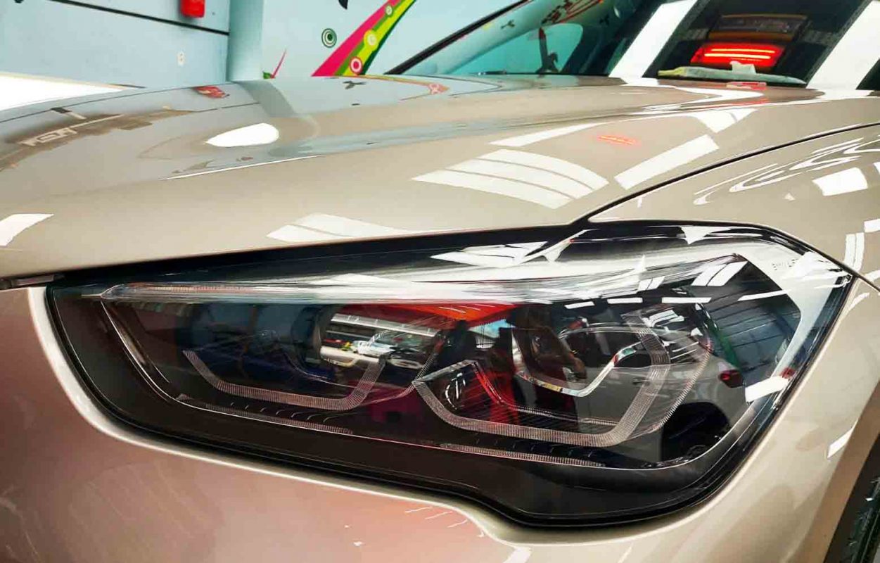 The X1's coated paintwork showing clean reflections.