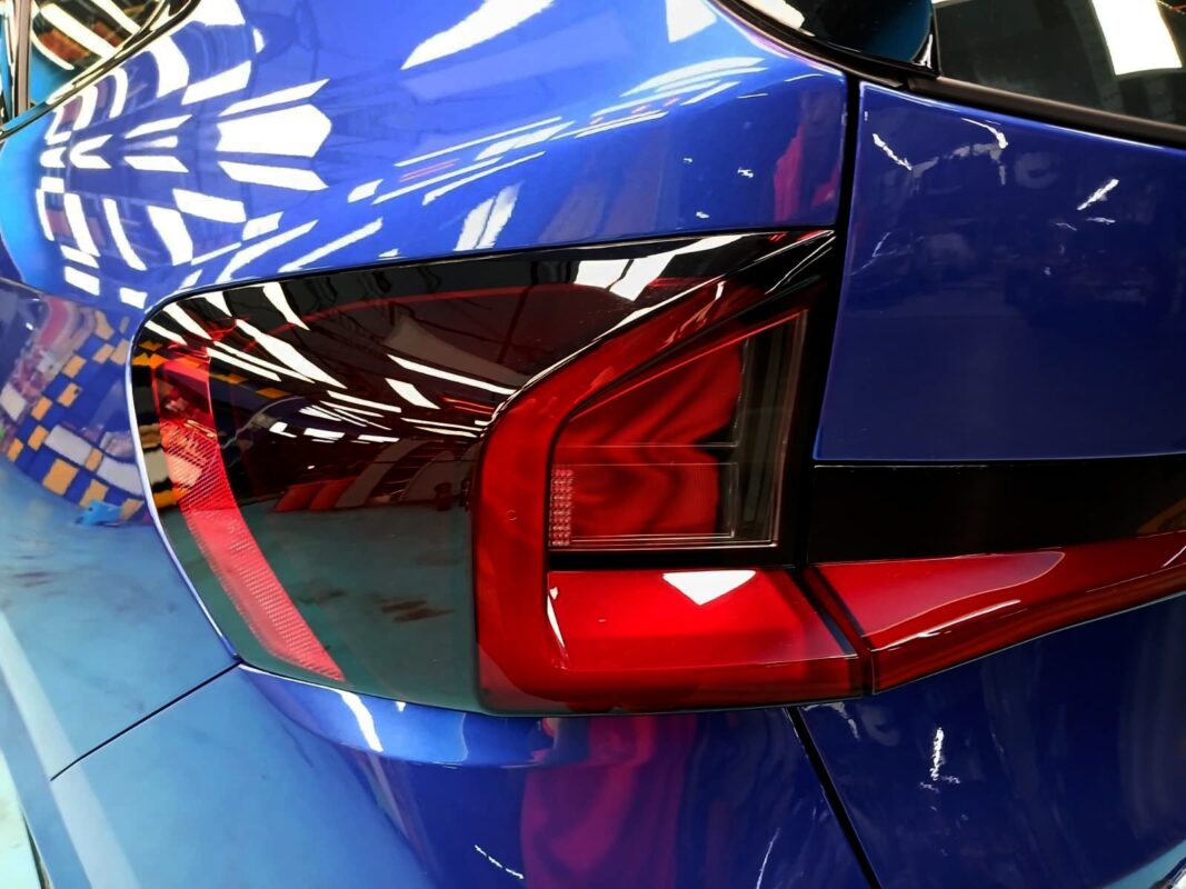 Rear quarter of the BMW X1, glossy and protected.