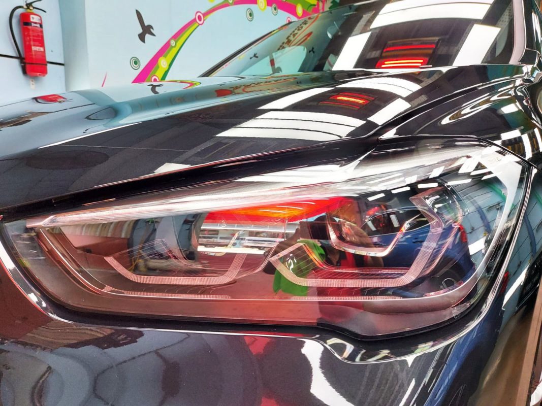 The X1's coated paintwork showing clean reflections.