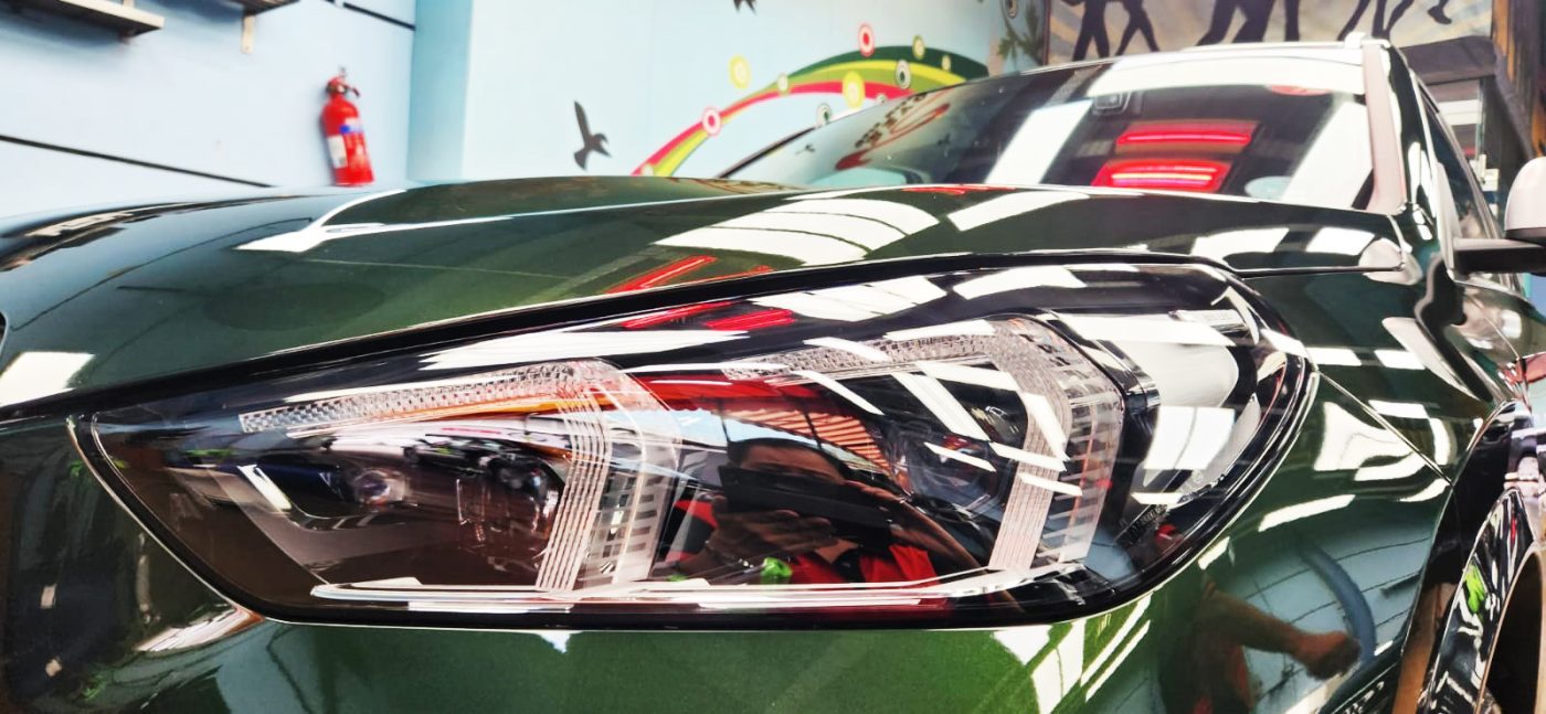 The X1's coated paintwork showing clean reflections.