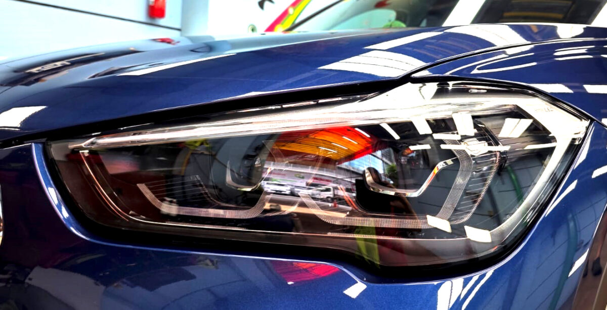 The X1's coated paintwork showing clean reflections.