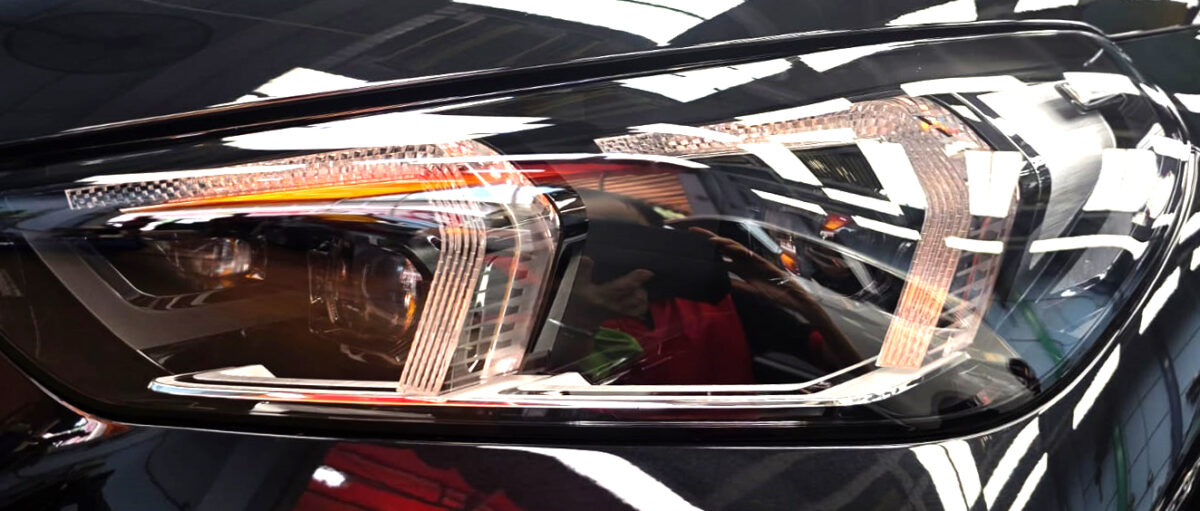 The X1's coated paintwork showing clean reflections.