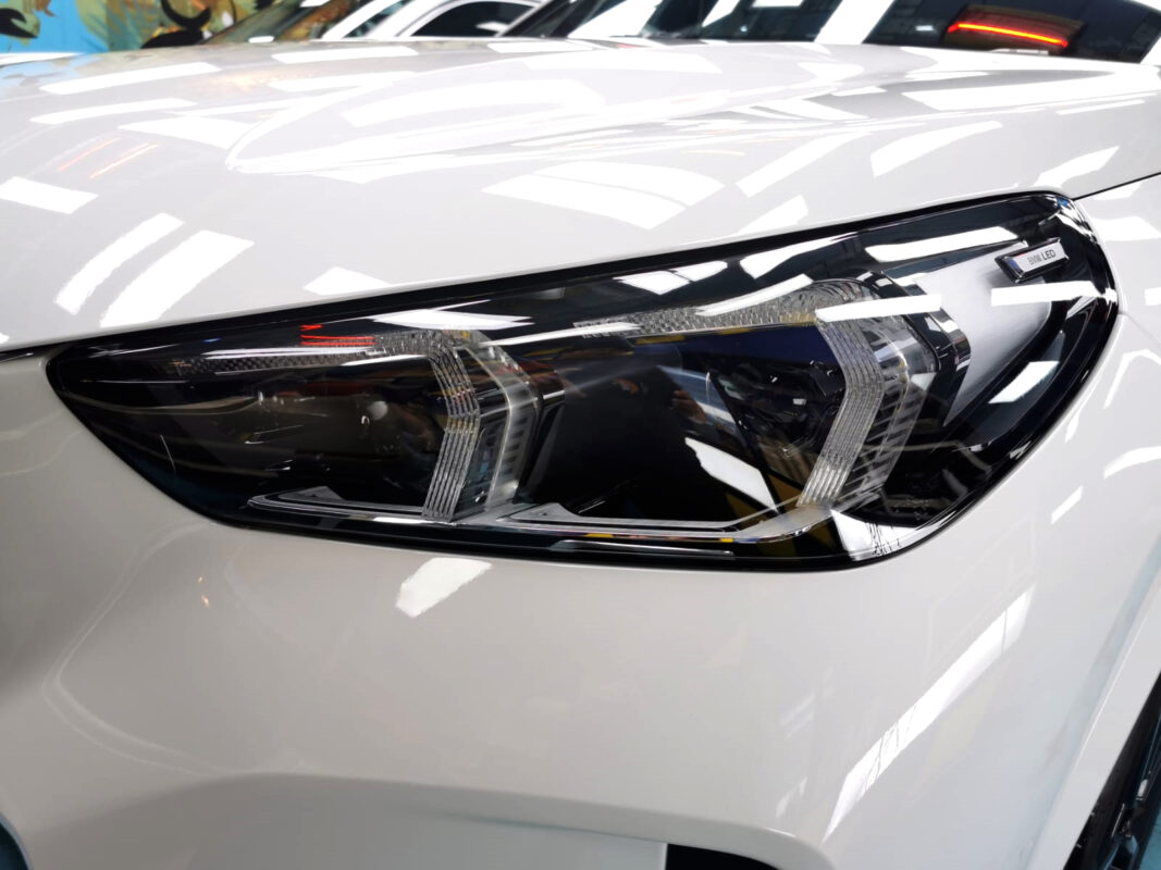 The X1's coated paintwork showing clean reflections.