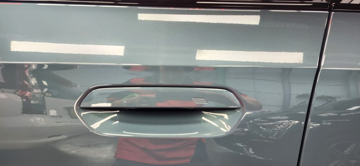 Front three-quarter view of the BMW X1 after coating.