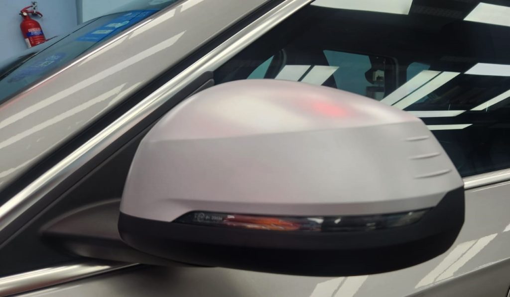 Side panel of the BMW X1 with the titanium finish locked in.
