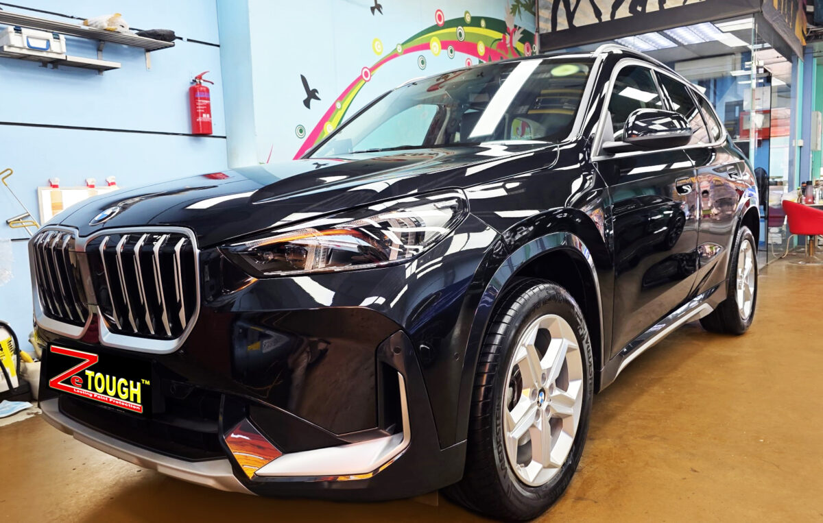 BMW X1, glossy after its ZeTough Titanium coating.