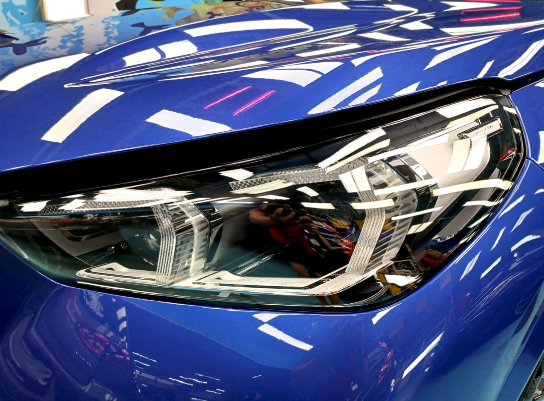 The X1's coated paintwork showing clean reflections.