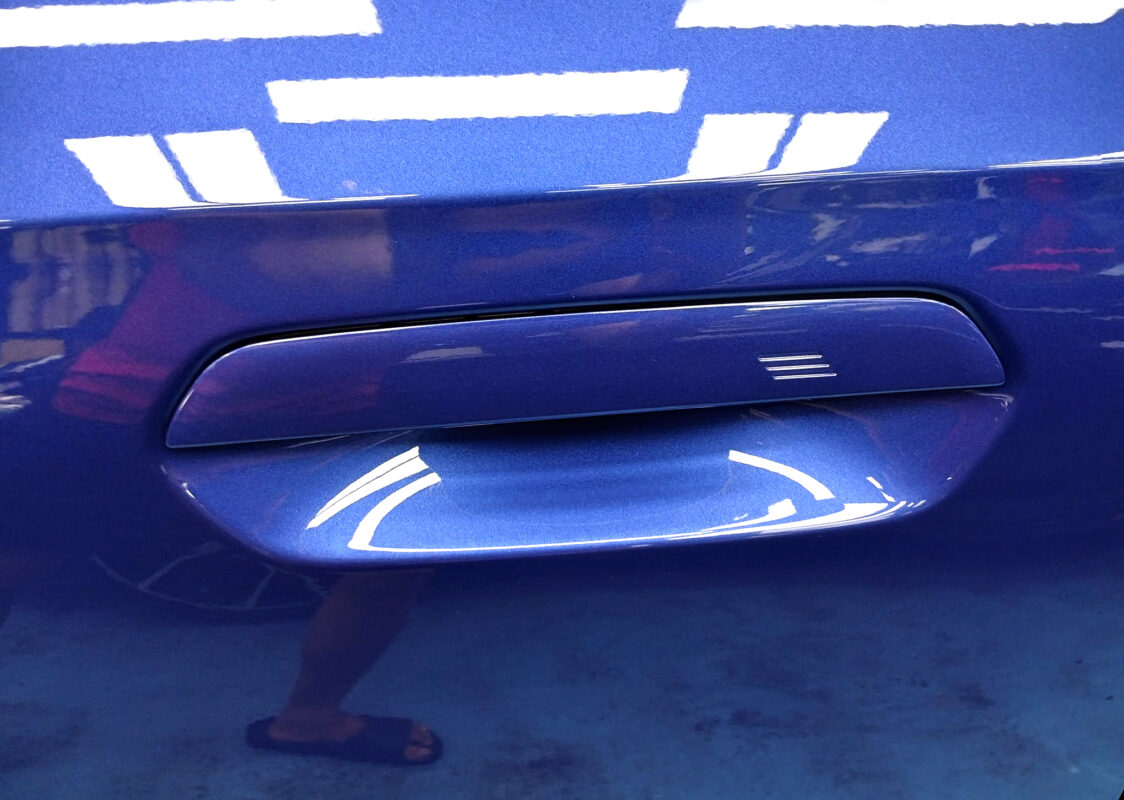 Front three-quarter view of the BMW X1 after coating.