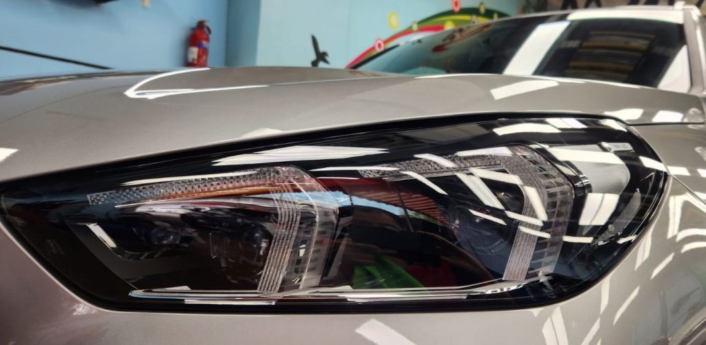 The X1's coated paintwork showing clean reflections.
