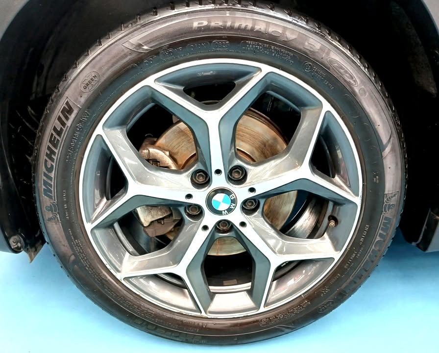 Y-spoke alloy wheel and Michelin tyre on the BMW X1.