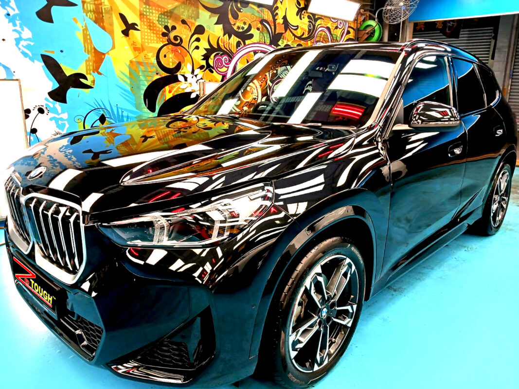 BMW X1, glossy after its ZeTough Ceramic coating.