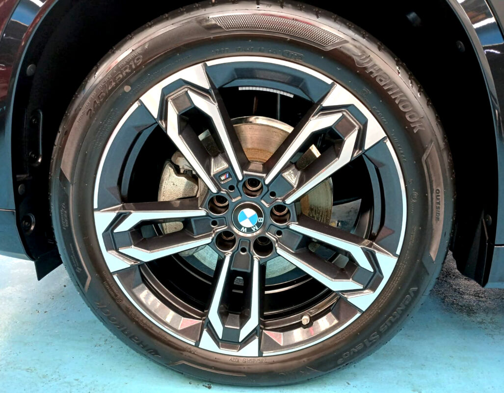 The BMW X1 with its fresh, coated finish.