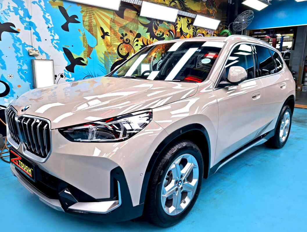 BMW X1, glossy after its ZeTough Titanium coating.