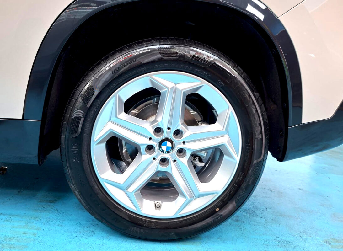 The BMW X1 with its fresh, coated finish.