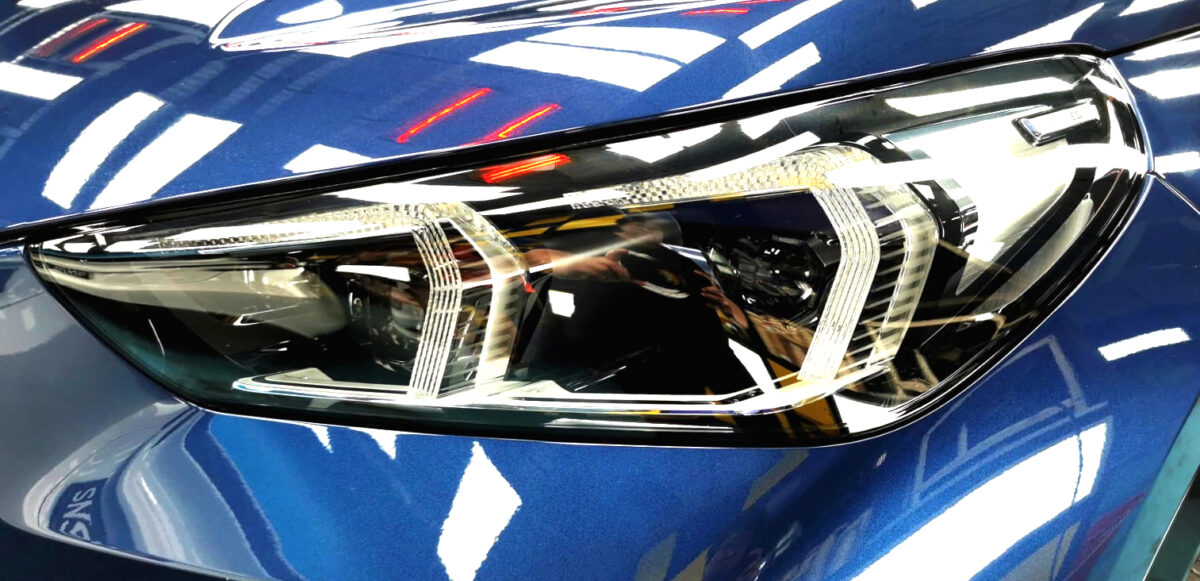 The X1's coated paintwork showing clean reflections.
