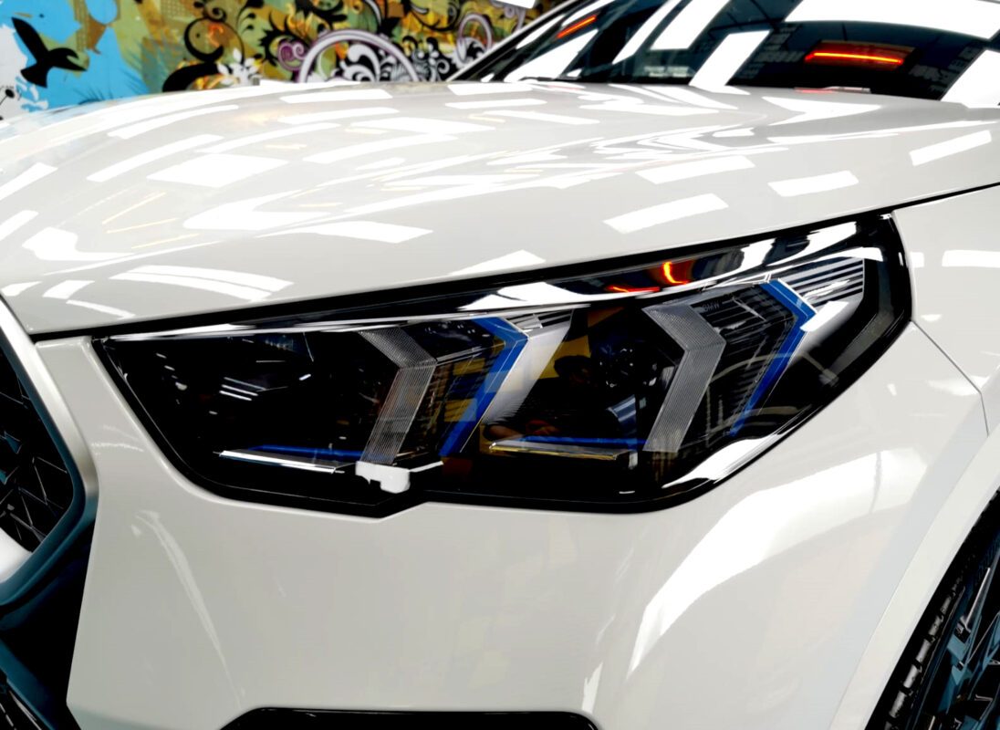 The X2's coated paintwork showing clean reflections.