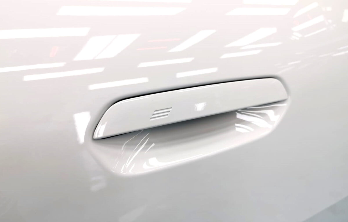 Front three-quarter view of the BMW X2 after coating.