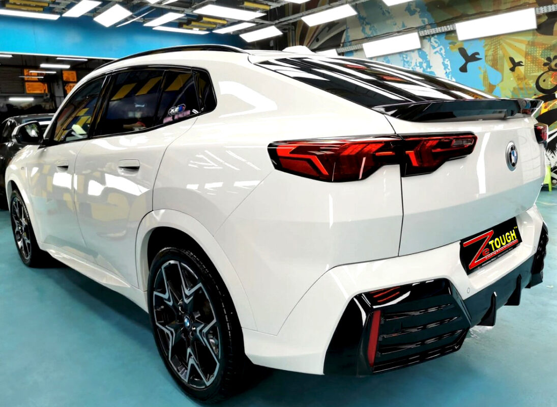 Rear quarter of the BMW X2, glossy and protected.