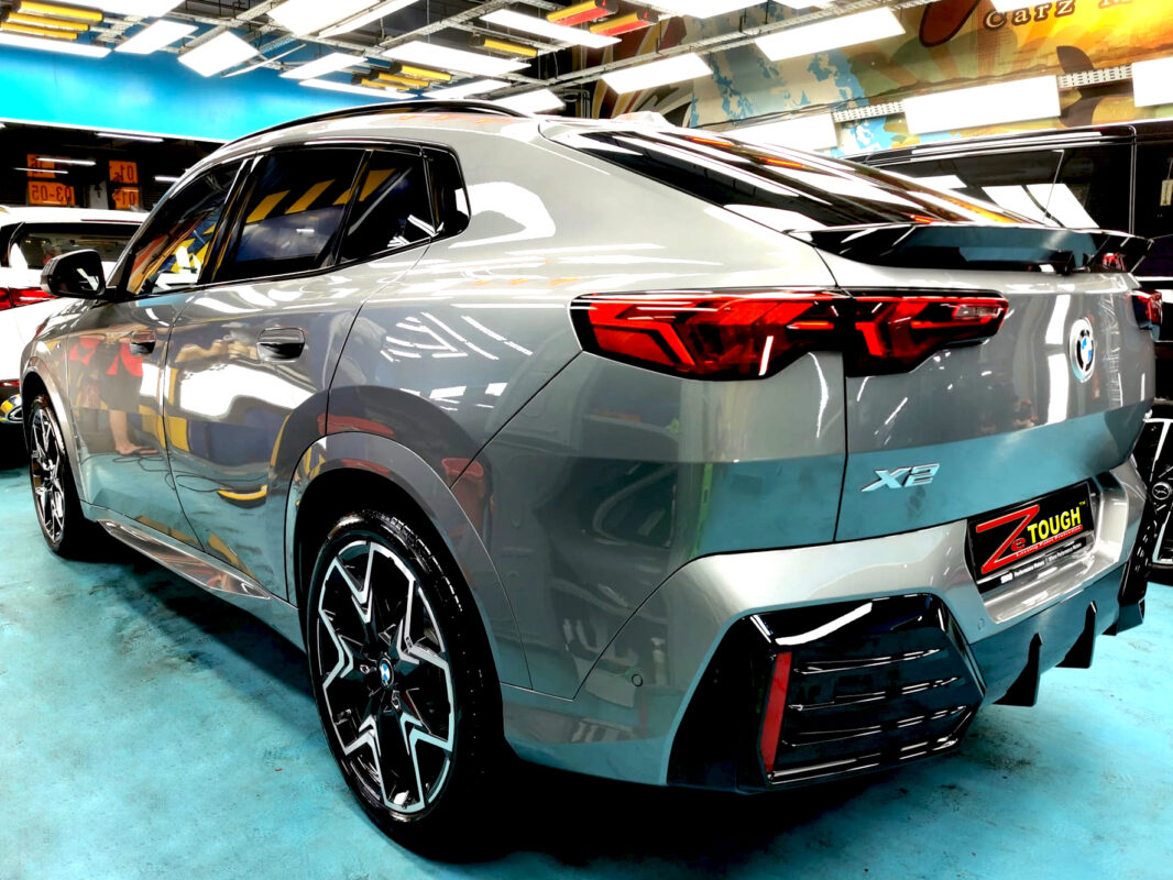 Rear quarter of the BMW X2, glossy and protected.