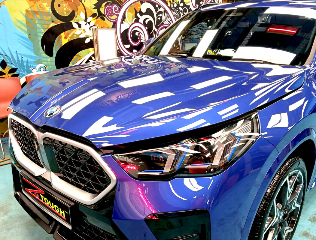 The BMW X2 from a side angle after the titanium coating.