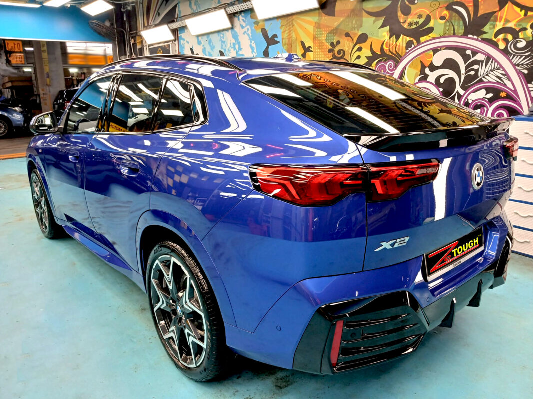 Rear quarter of the BMW X2, glossy and protected.