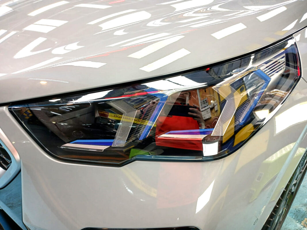 The X2's coated paintwork showing clean reflections.